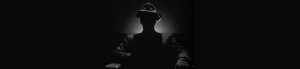 Man in shadows header
